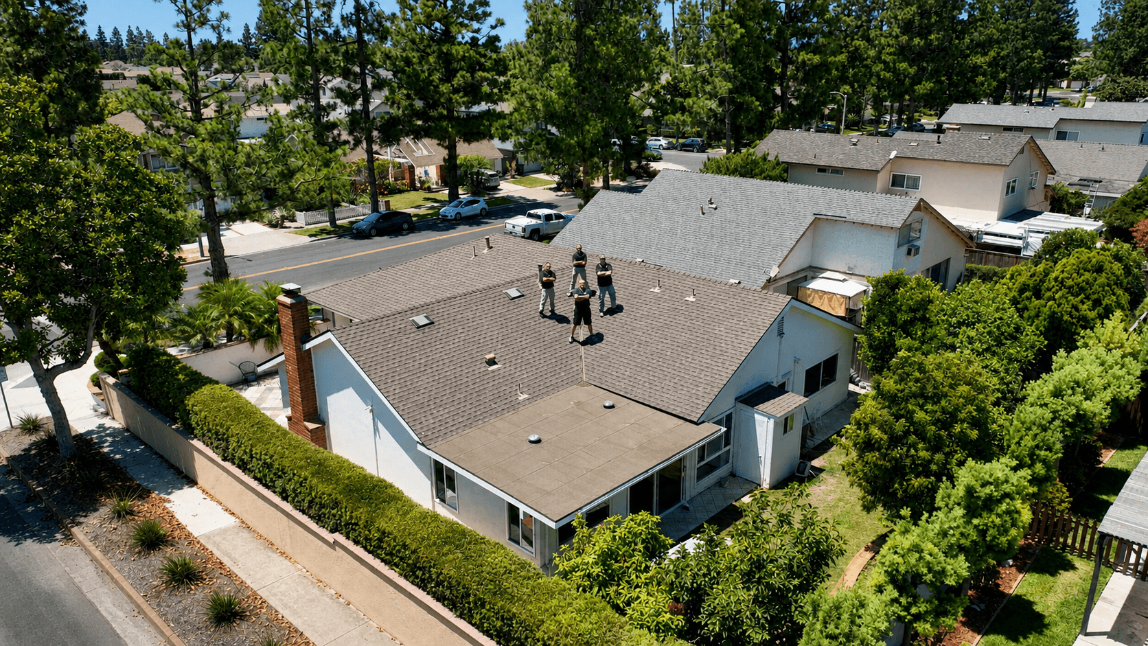 Trident Inspection Group team conducting roof inspection in Orange County