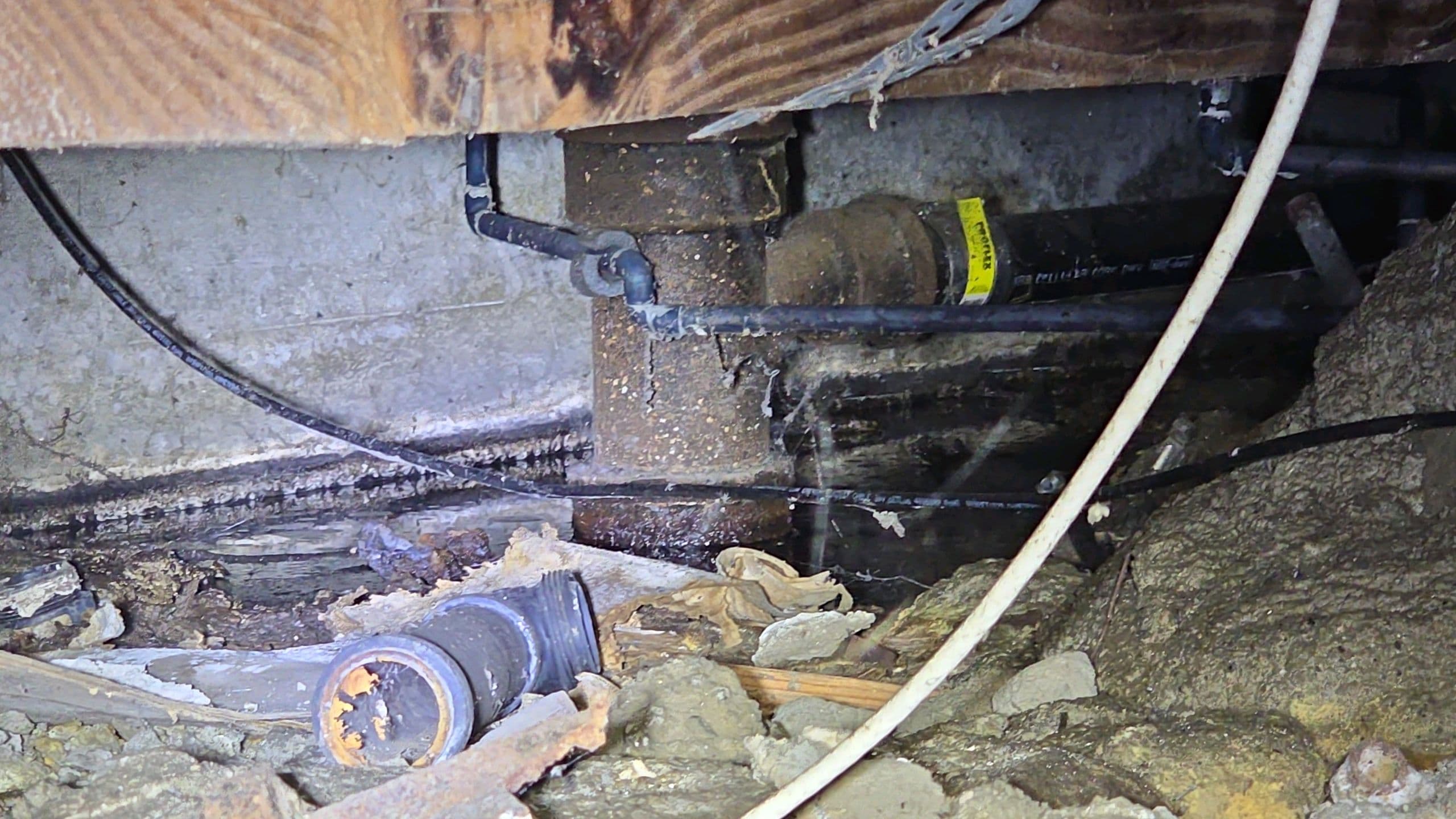 Foundation and plumbing condition found during a Trident crawlspace inspection